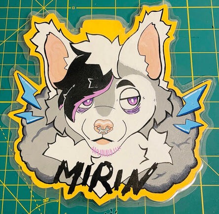 A posca badge for a greater glider character named Mirin